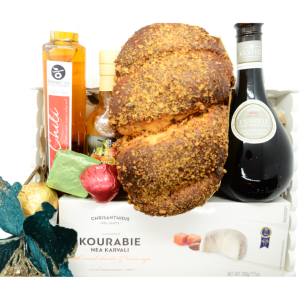 Cadoul Savory Present cu delicatese mediteraneene și prezentare festivă.