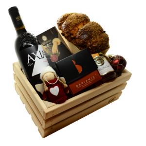 Cadoul Sweet Christmas cu delicii dulci și produse premium prezentate festiv.